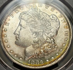 1883-O PCGS MS62 Morgan Silver $1 – Lovely Green/Yellow Rim Toning!
