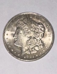 1921 Morgan Silver Dollar. Philadelphia mint. 90% Silver- 0.7734 Troy ounce.