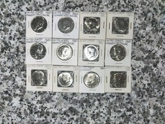 12 Kennedy half dollars, 40 percent silver, lot of 12 coins, $6 face value.