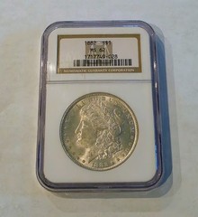 1882 Morgan Silver Dollar $1 NGC MS62 Vintage Gold Border ANA Holder