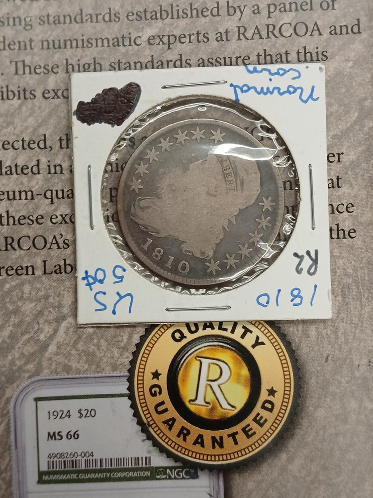 Silver 1810 Capped bust half dollar sealed in paper flap T-182