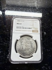 1884 O New Orleans Mint Morgan Silver Dollar $1 NGC MS 63 SHINEY